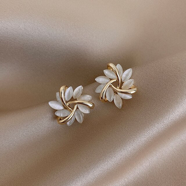 Luxurious White Earrings with Gold Opal