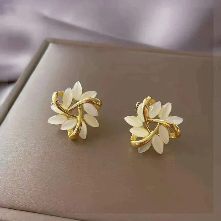 Luxurious White Earrings with Gold Opal